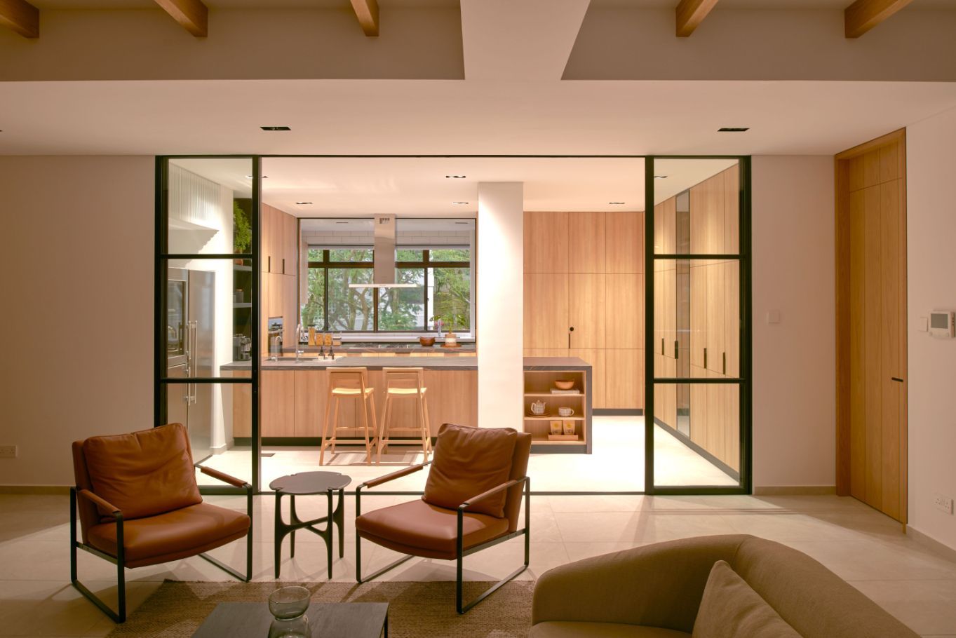 The sliding doors enclose the kitchen when needed