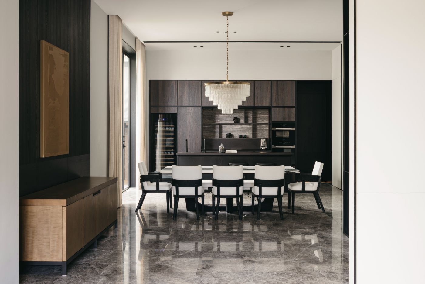The Liaigre Sumi table takes pride of place in the dining room (Photos: Joey Khu Interior Design and Studio Periphery)