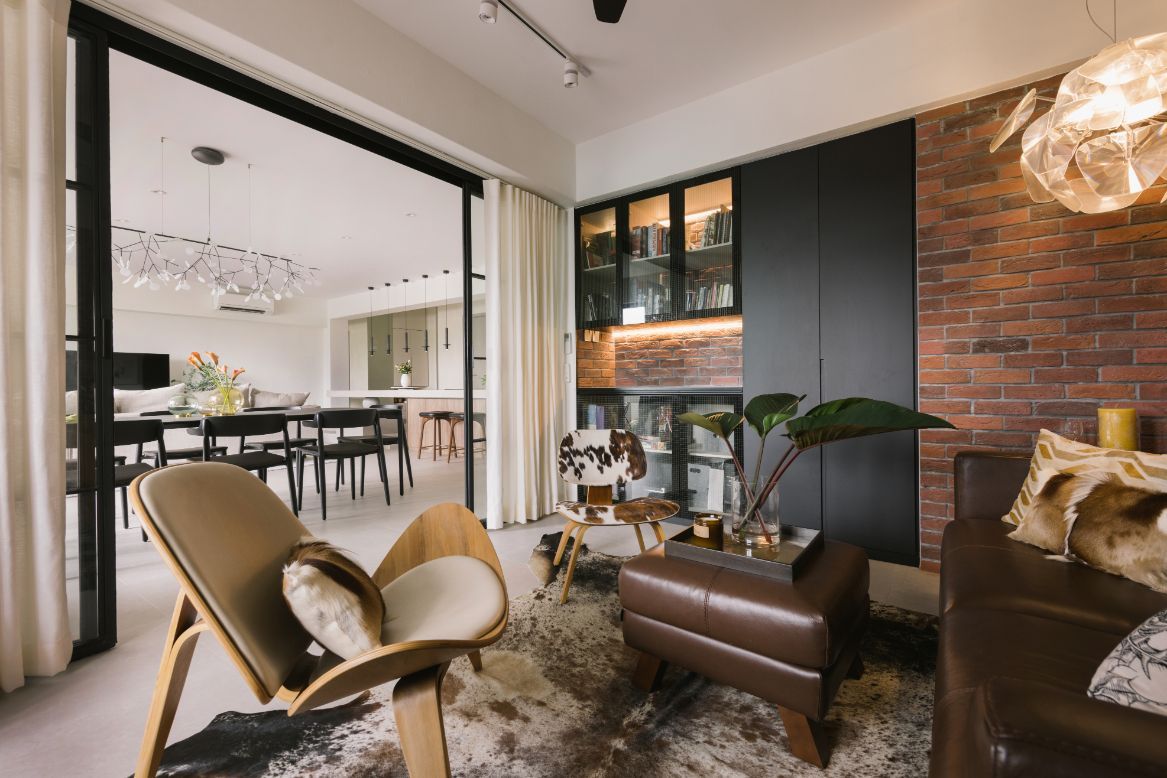 Faux brick walls reference the original brick facade of the condominium development