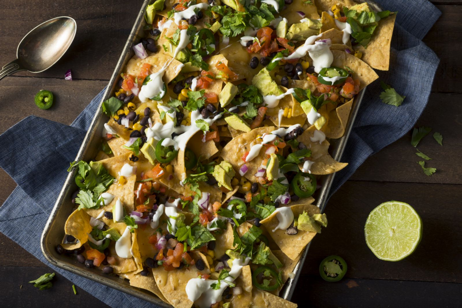 Loaded nachos with coriander and salsa verde