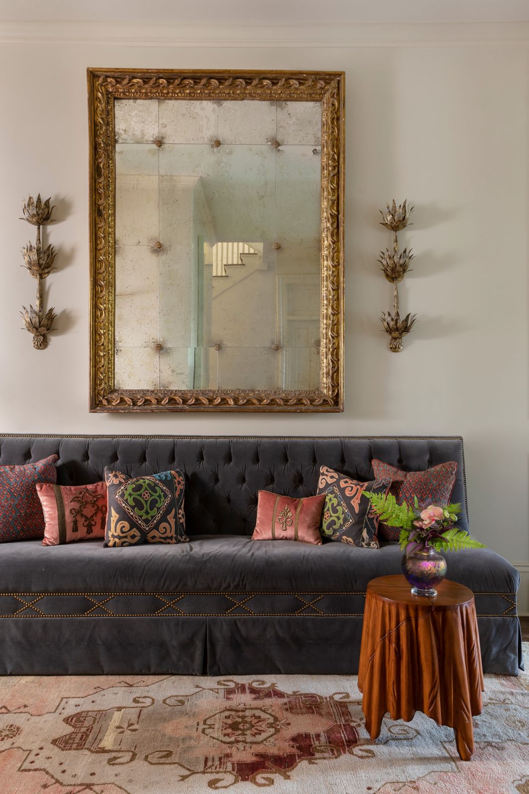 The foyer banquette in an art-filled residence (Photo: Instagram/@melissarufty)