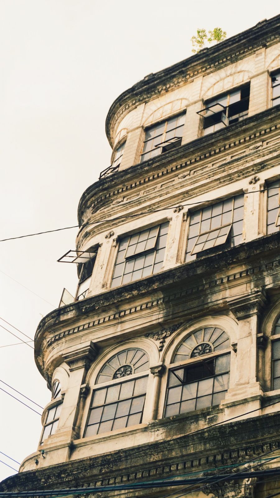 Parts of the El Hogar Filipino Building can be seen at the corner of Calle Juan Luna and Muelle dela Industría
