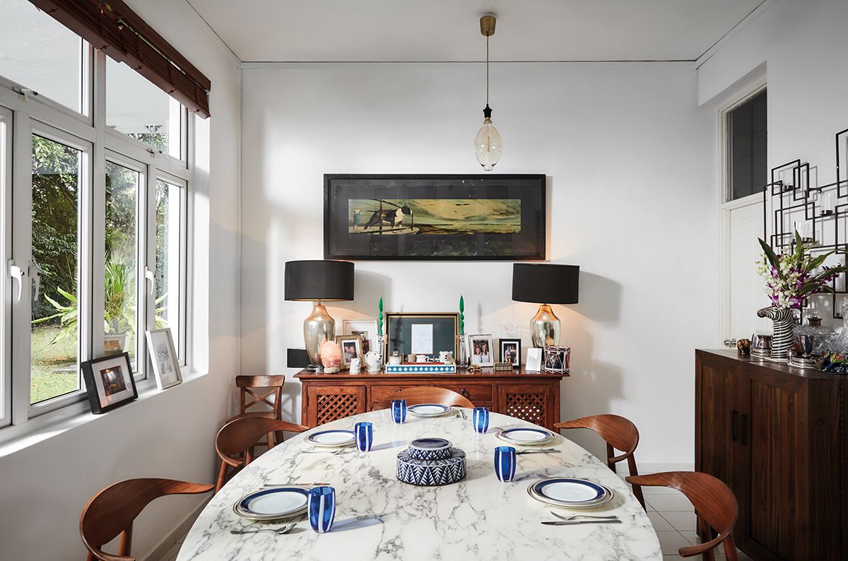 When outdoor dining is not in the cards, the family can comfortably set up their meals in this charming dining room, sheltered from the elements