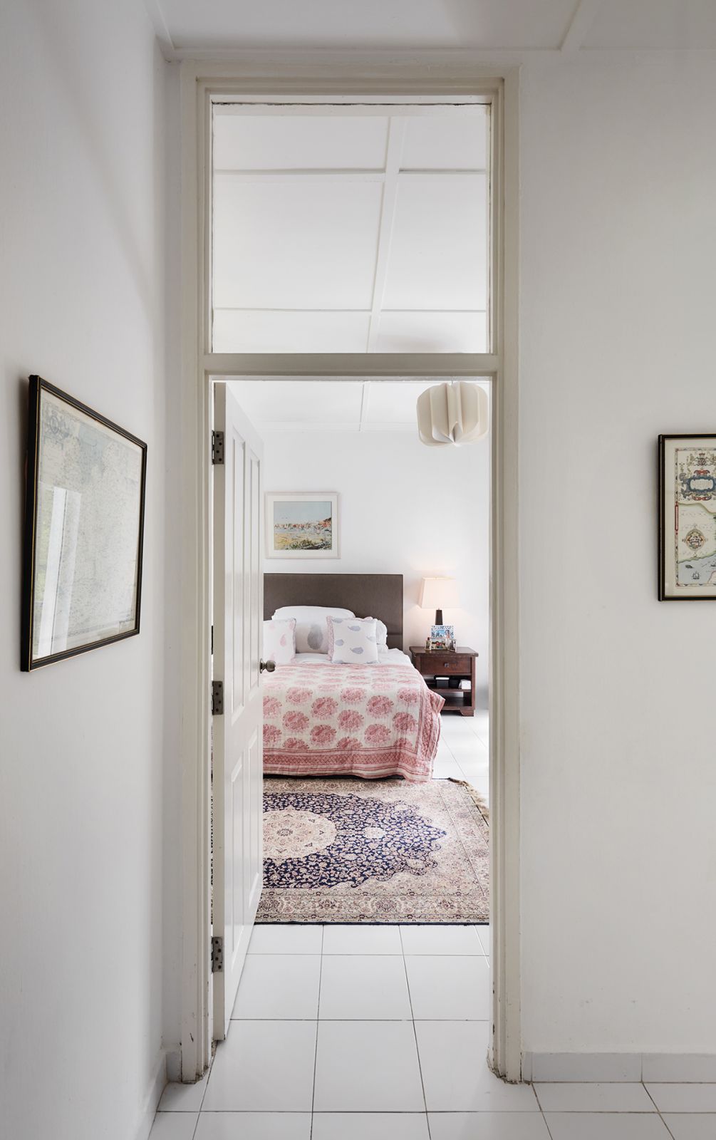 The paisley print throw and a Turkish rug indulge in some pattern play while making the master bedroom feel extra cosy