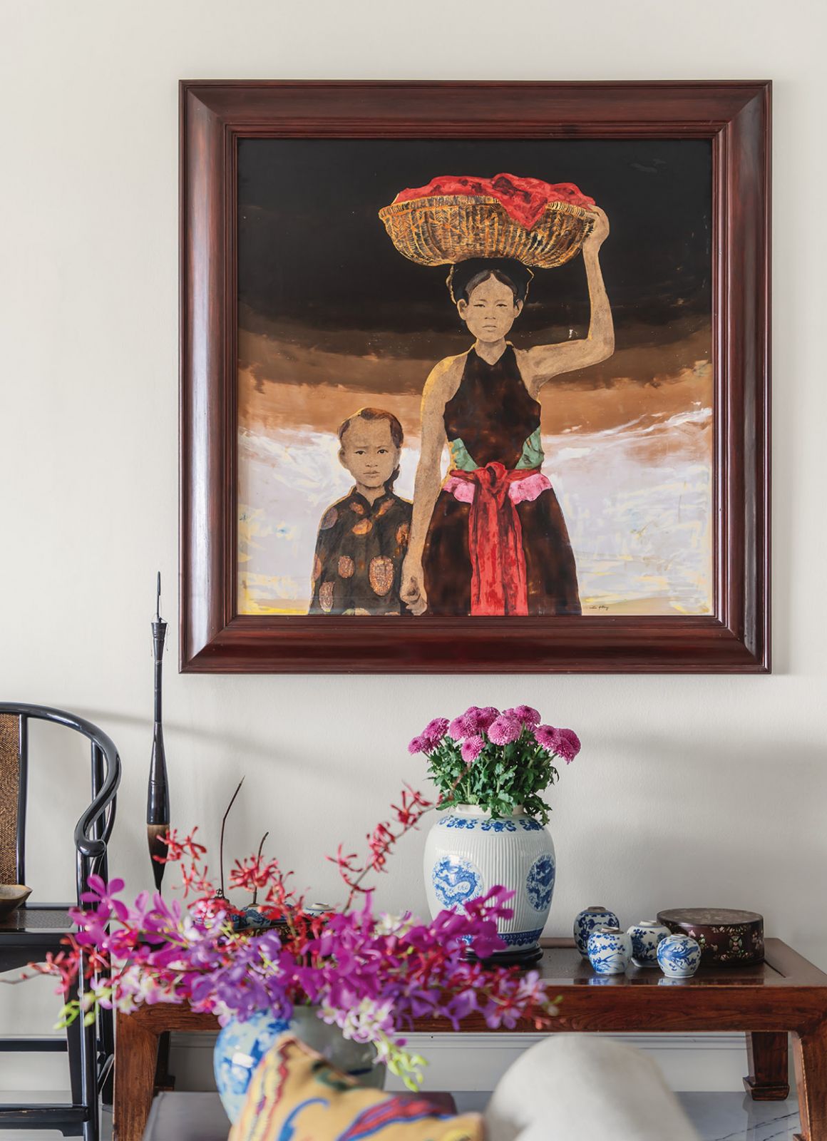 Vietnamese lacquerware by Bui Huu Hung, Chinese porcelain vases and a Mandarin chair are among the home’s many Asian touches