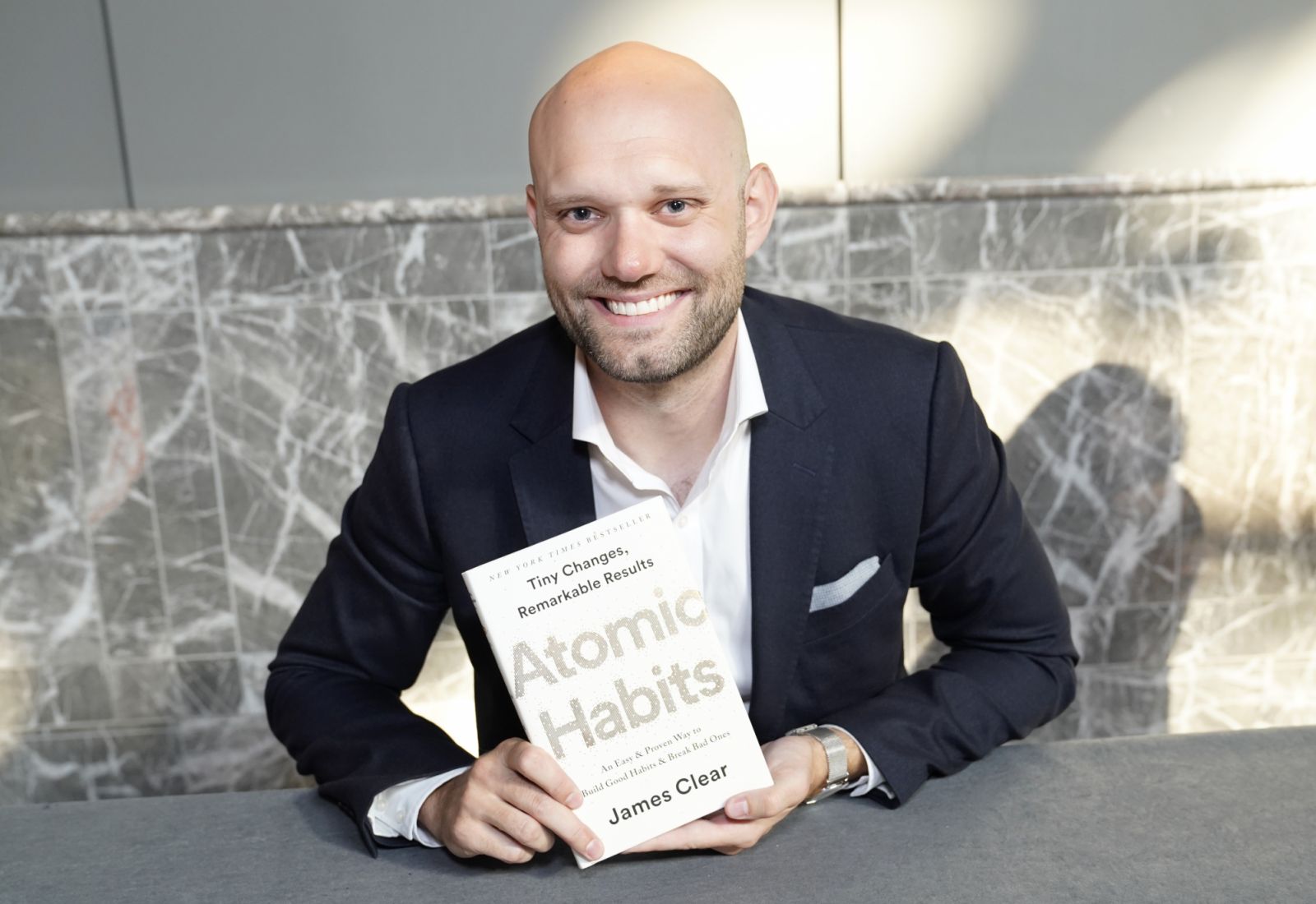 Author James Clear with his book (Photo: Getty Images)