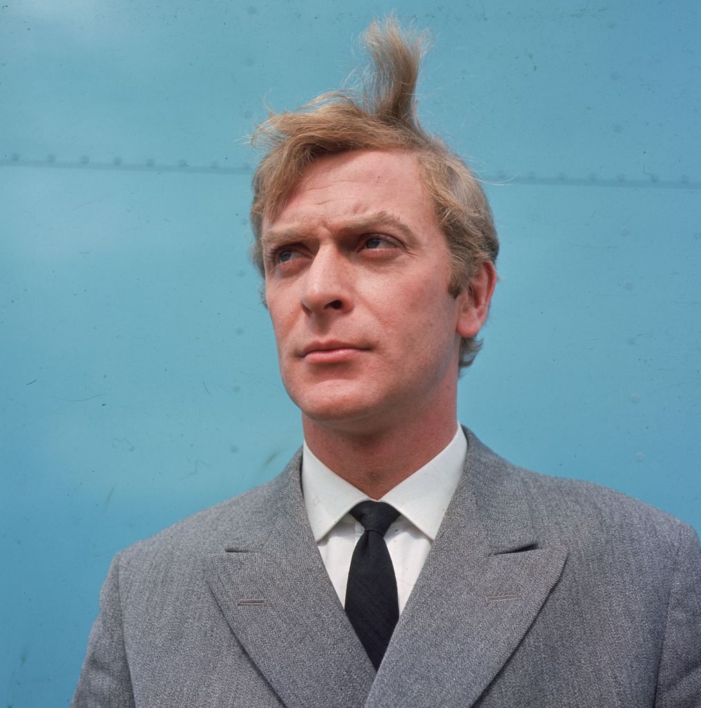 circa 1965: British actor Michael Caine, the star of 'Alfie' and 'Get Carter', looking windswept. (Photo by Hulton Archive/Getty Images)