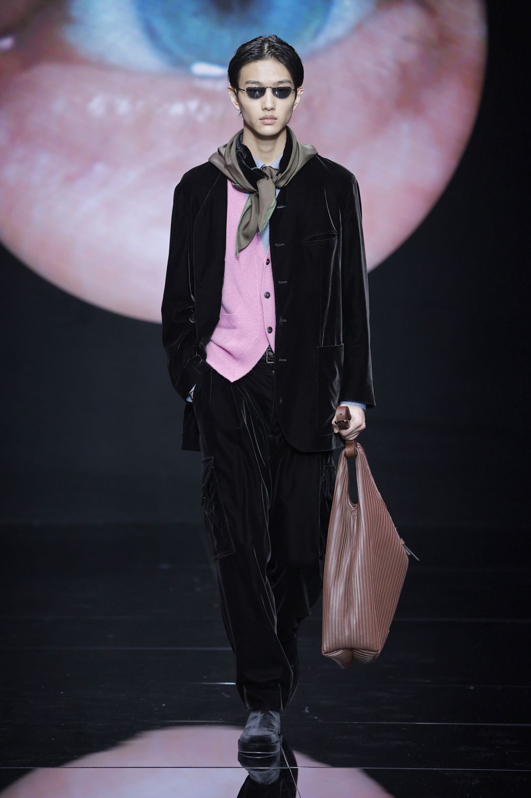 MILAN, ITALY - JANUARY 15: A model walks the runway at the Giorgio Armani fashion show during the Milan Menswear Fall/Winter 2024-2025 on January 15, 2024 in Milan, Italy. (Photo by Estrop/Getty Images)