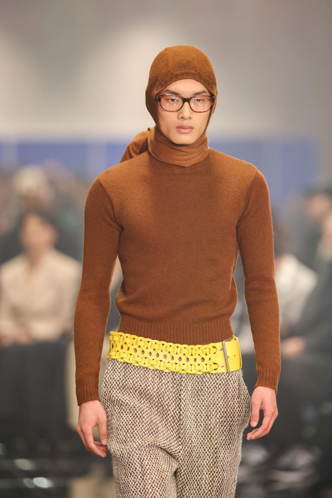 MILAN, ITALY - JANUARY 14: A model walks the runway at the Prada fashion show during the Milan Menswear Fall/Winter 2024-2025 on January 14, 2024 in Milan, Italy. (Photo by Daniele Venturelli/WireImage)