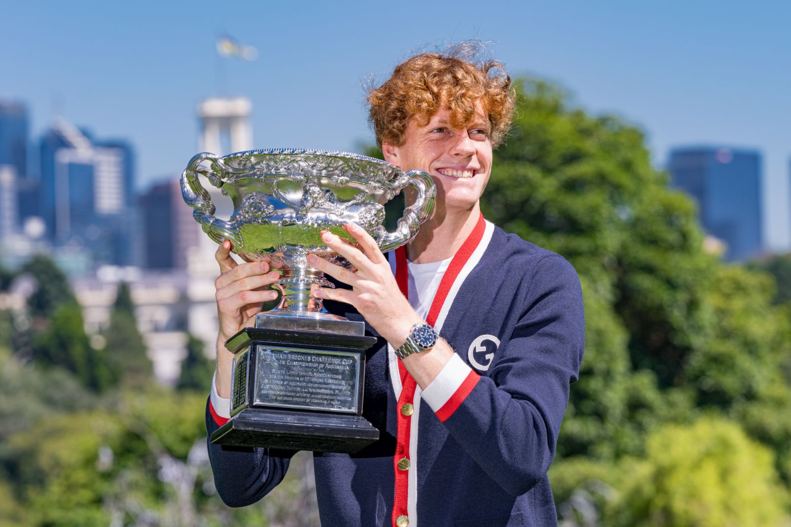 MELBOURNE, AUSTRALIA - JANUARY 29: Jannik Sinner of Italy poses with the Norman Brookes Challenge Cup after winning the 2024 Australian Open Final, at Royal Botanic Gardens on January 29, 2024 in Melbourne, Australia. (Photo by Andy Cheung/Getty Images)