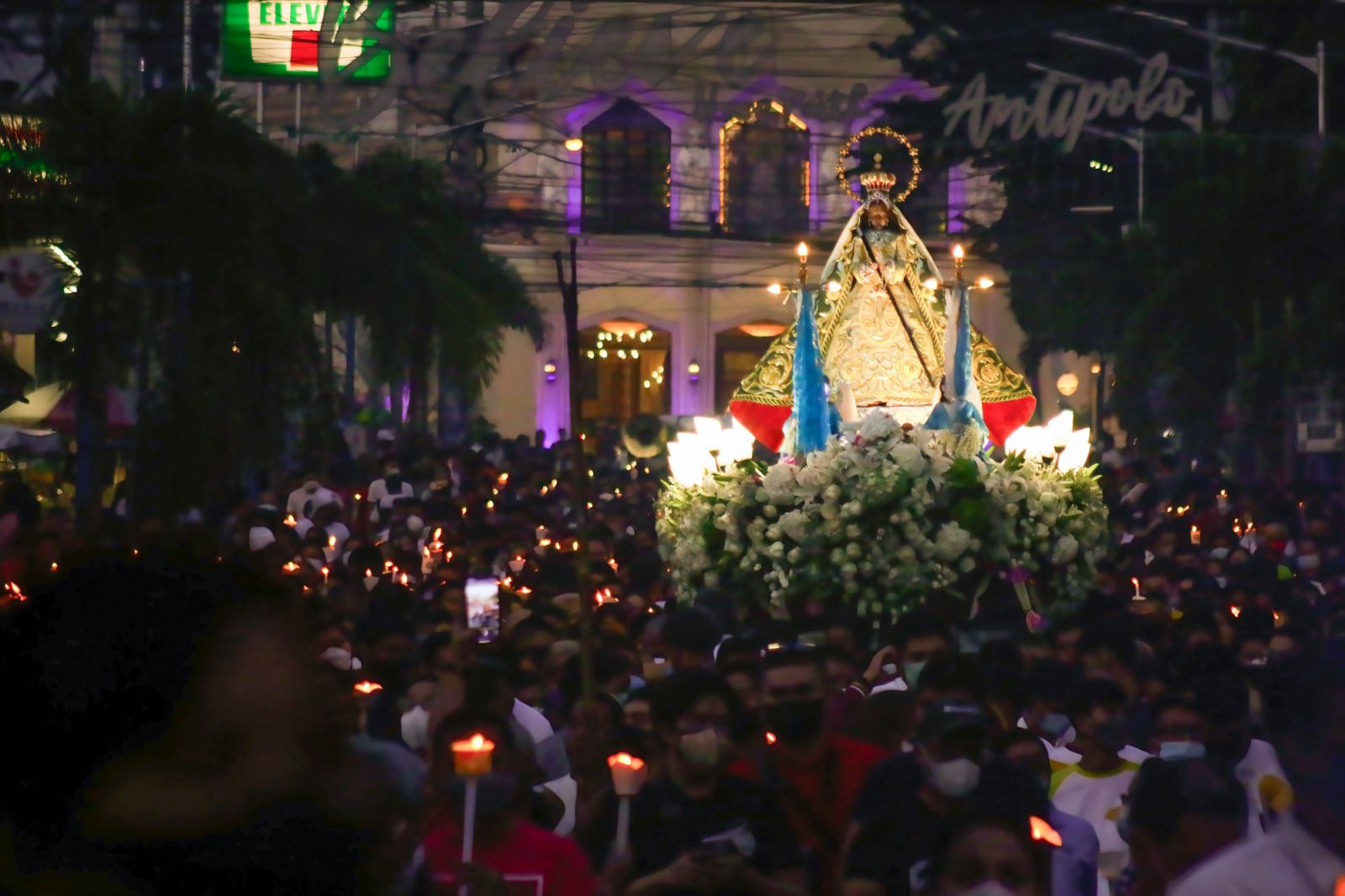 ANTIPOLO, RIZAL, PHILIPPINES - 2022/07/05: Marian devotees from Antipolo Cathedral join a solemn procession for the first time since the start of the pandemic two years back. The Antipolo Cathedral is a Roman Catholic cathedral that enshrines the Marian image of Our Lady of Peace and Good Voyage. On June 18, the Vatican recognized the Antipolo Cathedral as the 11th international shrine, making it the Philippines' first international shrine and the first in Asia. The wooden Marian image of Our Lady of Peace