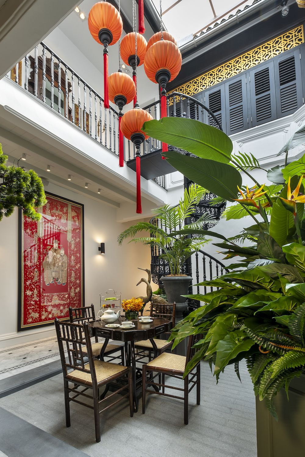 The wrought iron spiral staircase was sourced from India