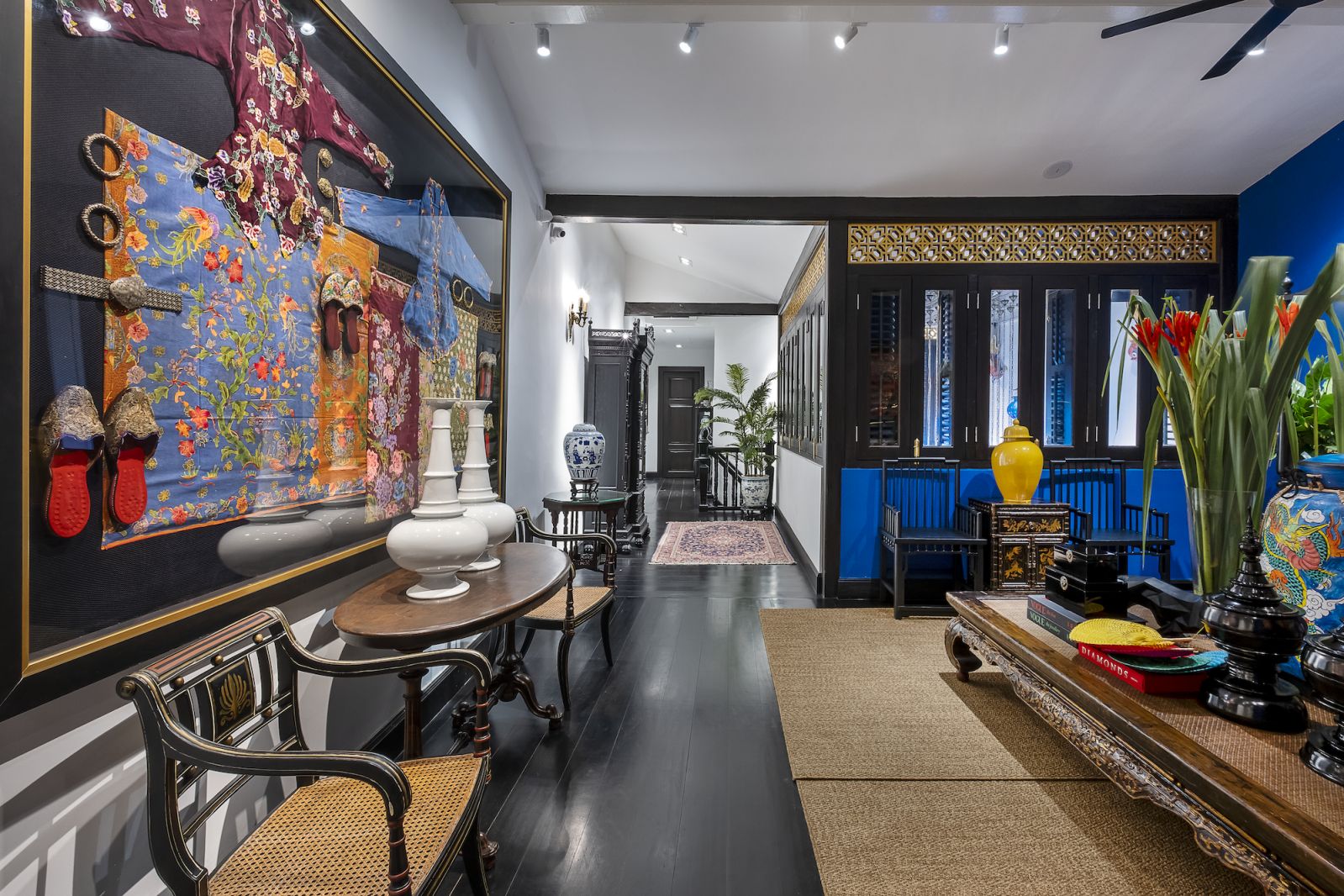 The upstairs living space has exquisite antique pieces
