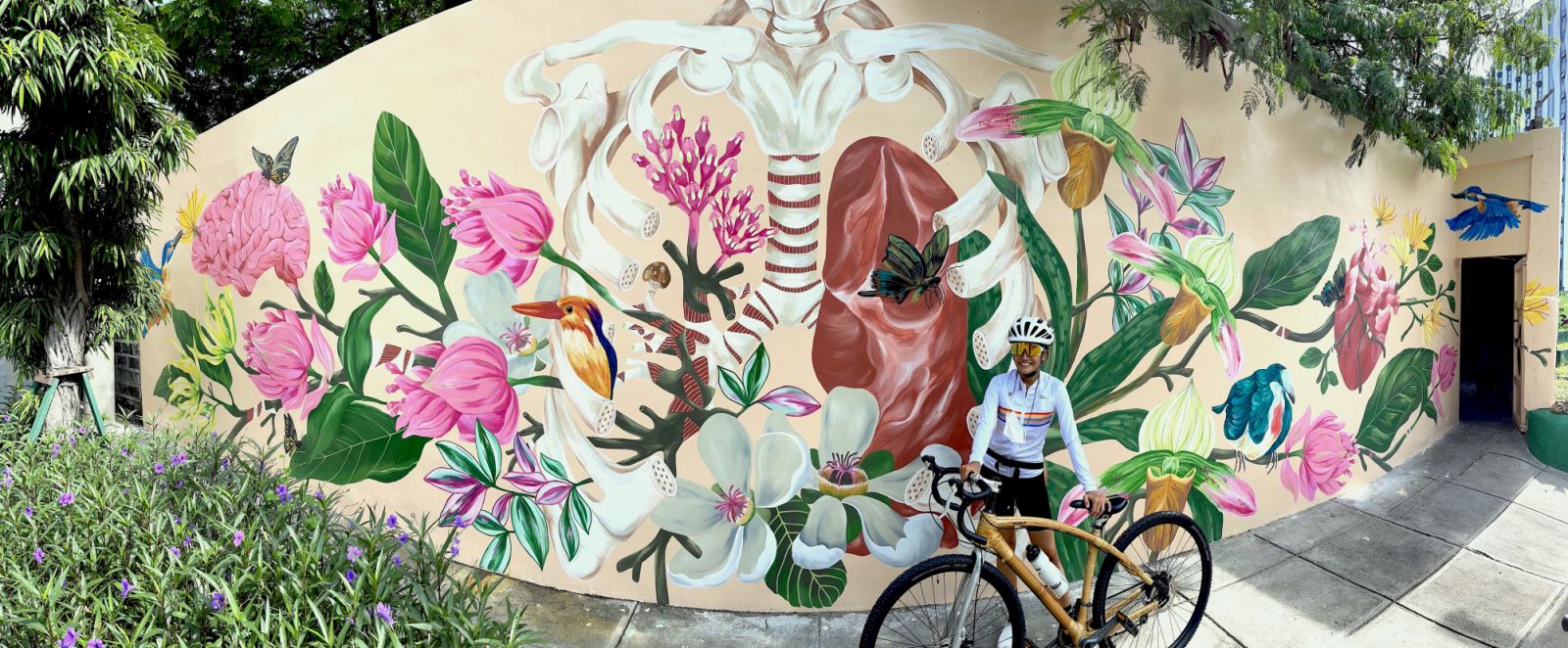 Anina Rubio and her mural near St Luke’s Medical Center