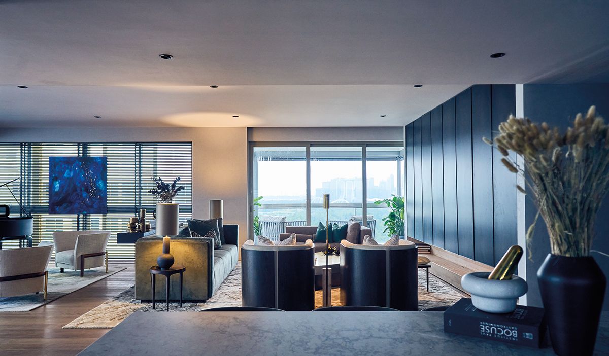 The roomy living area is a thoughtfully composed space that celebrates the enviable view