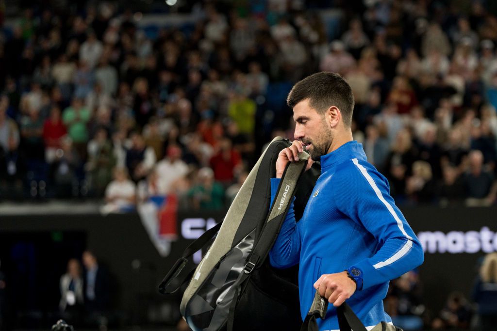 MELBOURNE, AUSTRALIA - JANUARY 17: Novak Djokovic of Serbia leaves the arena after winning match point in his round two singles match against Alexei Popyrin of Australia during day four of the 2024 Australian Open at Melbourne Park on January 17, 2024 in Melbourne, Australia. (Photo by Andy Cheung/Getty Images)
