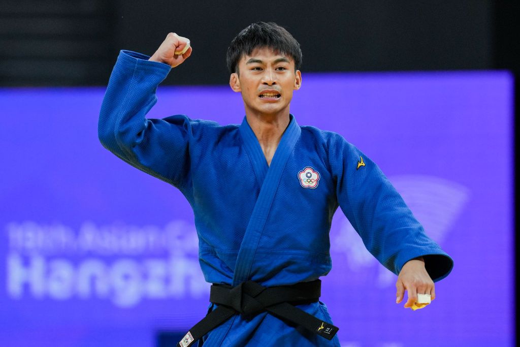 HANGZHOU, CHINA - SEPTEMBER 24: Yang Yung Wei of Chinese Taipei celebrates the victory in the Judo Men's 60KG Gold Medal match against Lee Harim of Korea during day one of the 19th Asian Games at Xiaoshan Linpu Gymnasium on September 24, 2023 in Hangzhou, China. (Photo by Shi Tang/Getty Images)