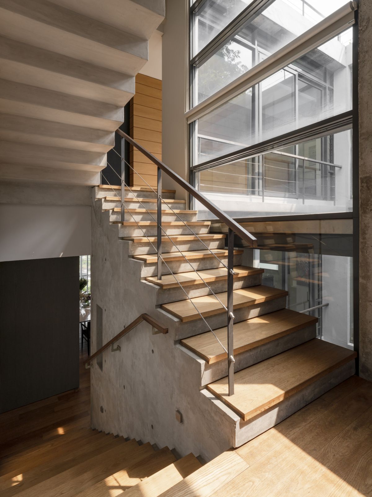 Natural light streams into the home through strategically designed glazing