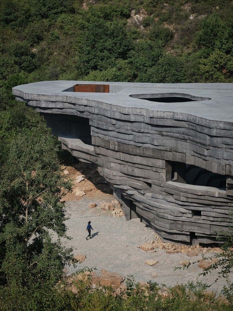 The layered façade reminiscent of the striated rock formations of the nearby mountains (Photo: Instagram / @open.architecture)