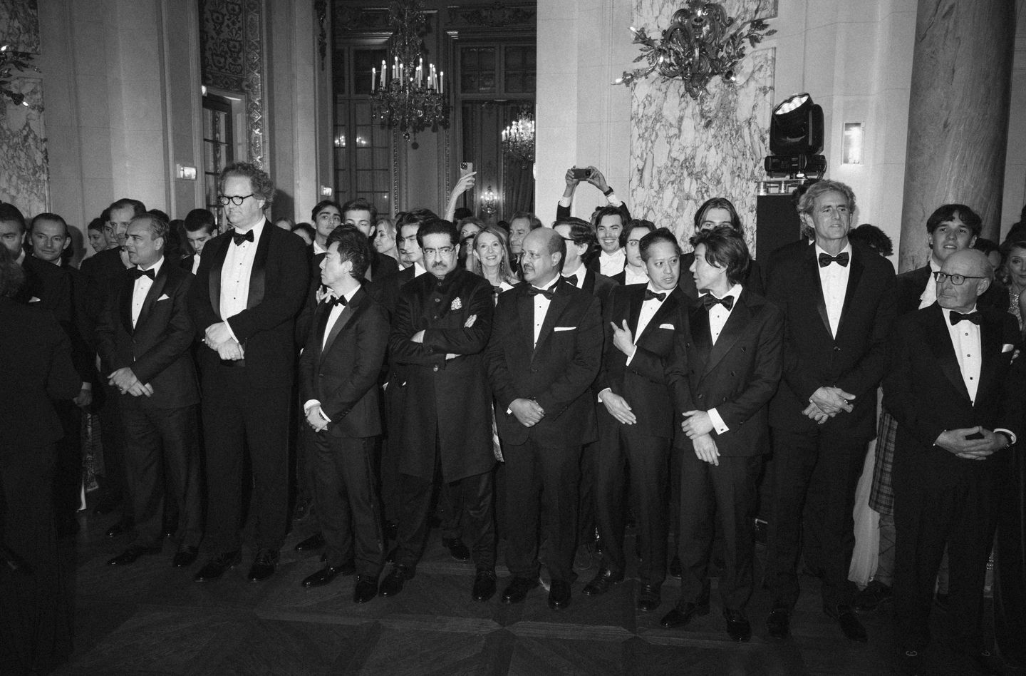 The debutantes' fathers assemble at the Grand Ballroom of the Shangri-La Paris Hotel