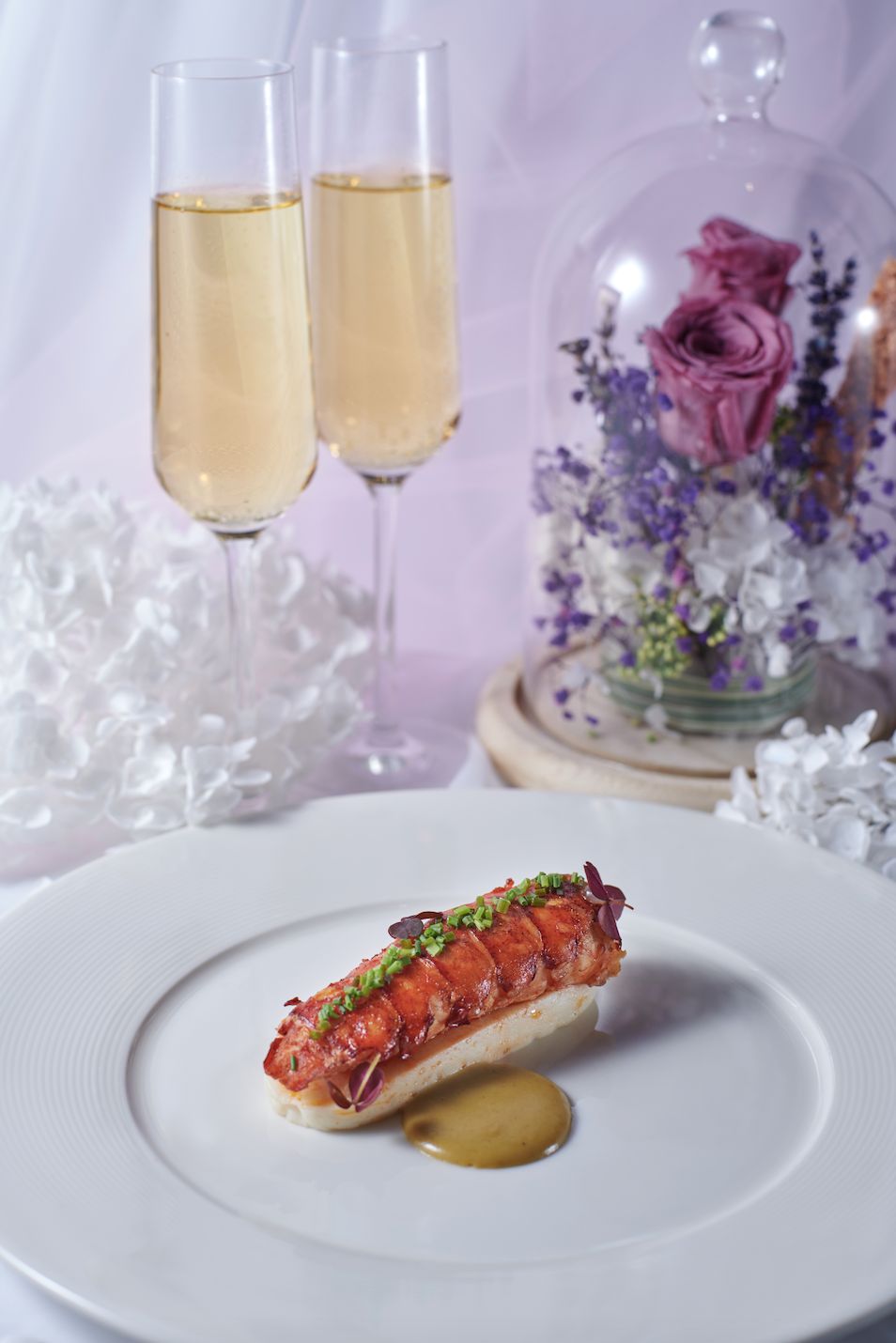 Lobster aqua pazza, basil oil, scallop mousse, and spiced velouté (Photo: Sabayon)