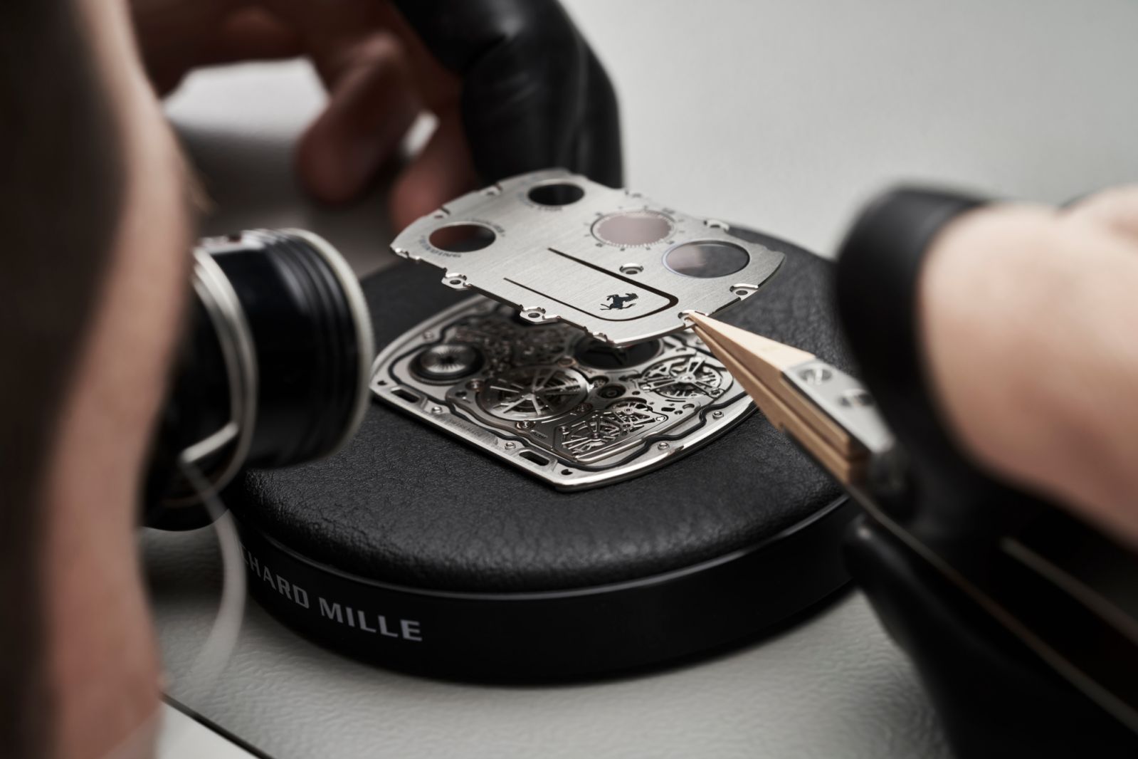 A watchmaker working on the RM UP-01 Ferrari (Photo: courtesy of Richard Mille)