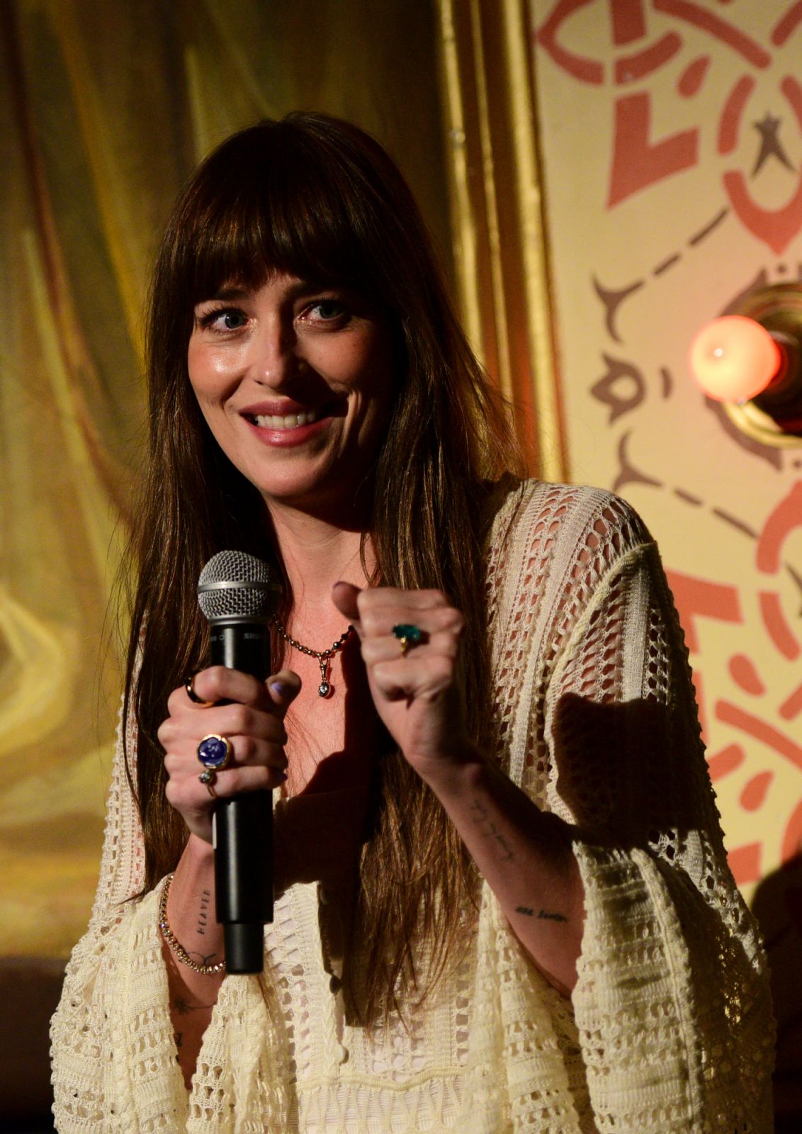 Dakota Johnson in Jessica McCormack necklace and ring, Hermina Athens ring, Jennifer Meyer bracelet. (Photo: Getty)