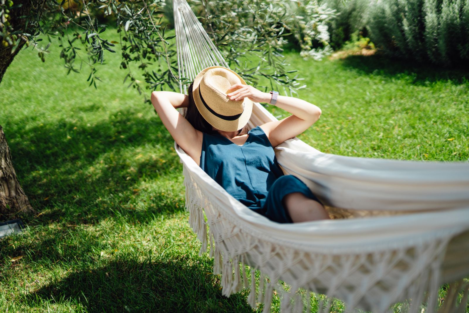 Young Asian woman enjoying a relaxing holiday. Mindfulness and wellbeing concept.