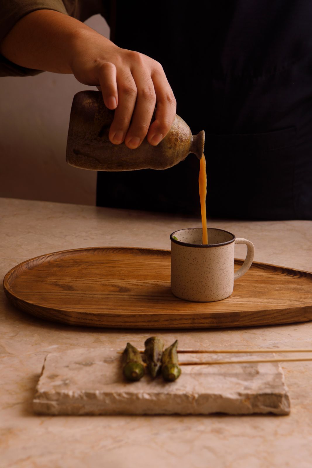 Chicken soup: deeply flavourful broth with grilled hen of the woods mushrooms and grilled okra from Inato by JP Cruz