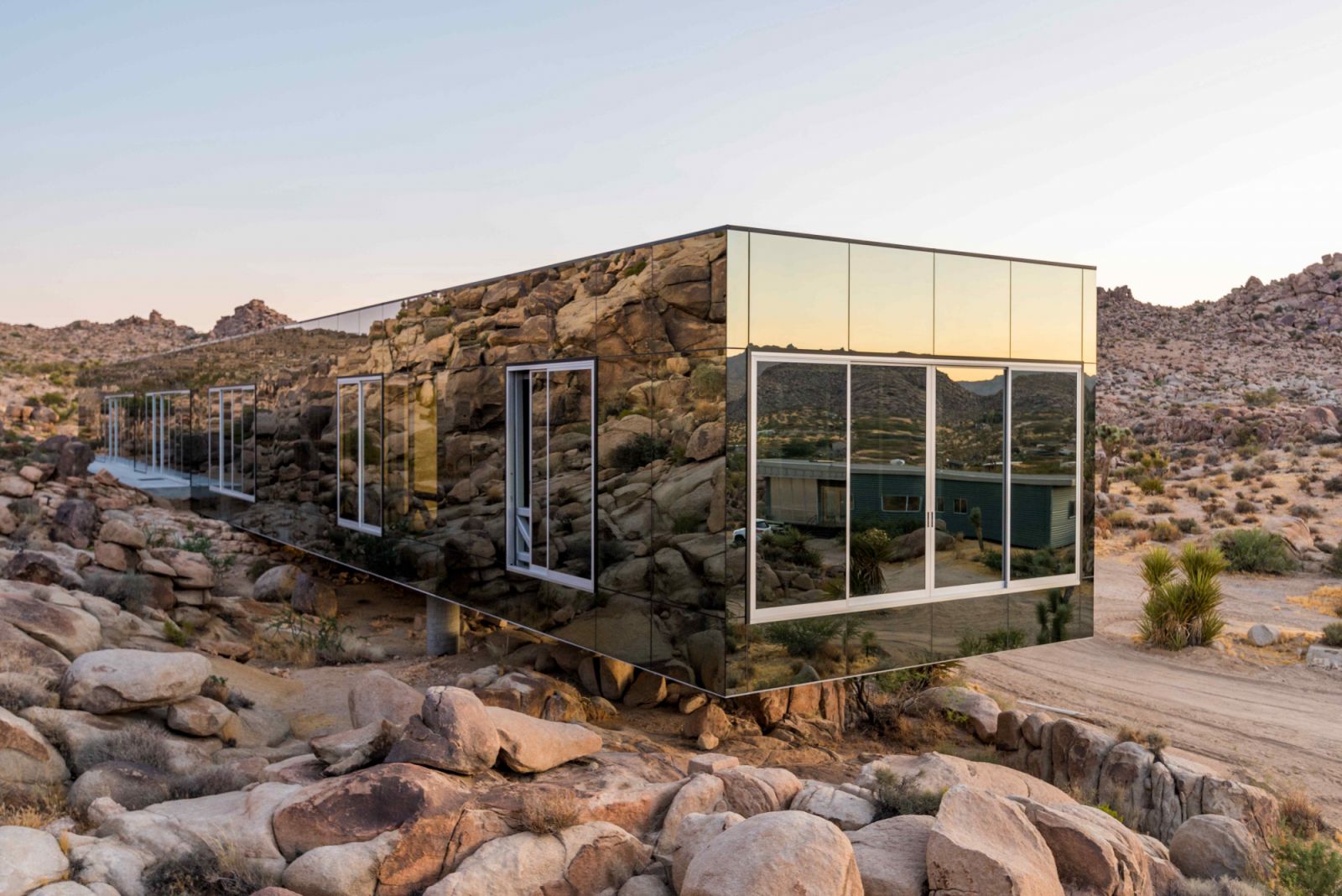 The Solarcool glass exterior that reflects the natural beauty of the surrounding desert landscape