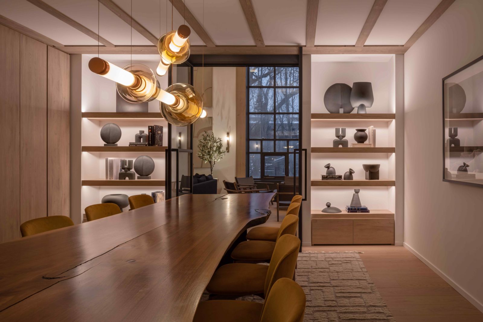 Niches in the dining area repurposed into shelving units