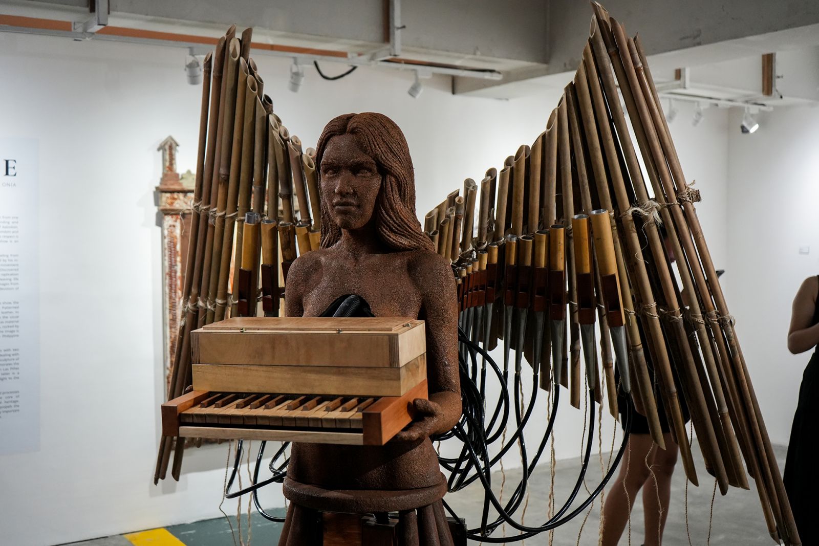 (Detail 2) Eski x Tagle x Diego Cera Organbuilders, Musika ng Loob, Bamboo pipes, wooden keyboard, bamboo, wood, sawdust, plastic hose, metal, leather, 79 x 73 x 44 inches, 2024