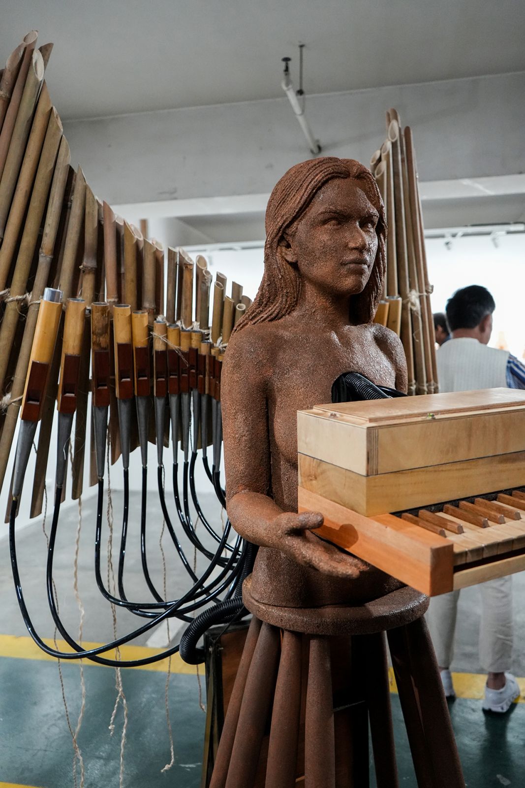 (Detail 2) Eski x Tagle x Diego Cera Organbuilders, Musika ng Loob, Bamboo pipes, wooden keyboard, bamboo, wood, sawdust, plastic hose, metal, leather, 79 x 73 x 44 inches, 2024