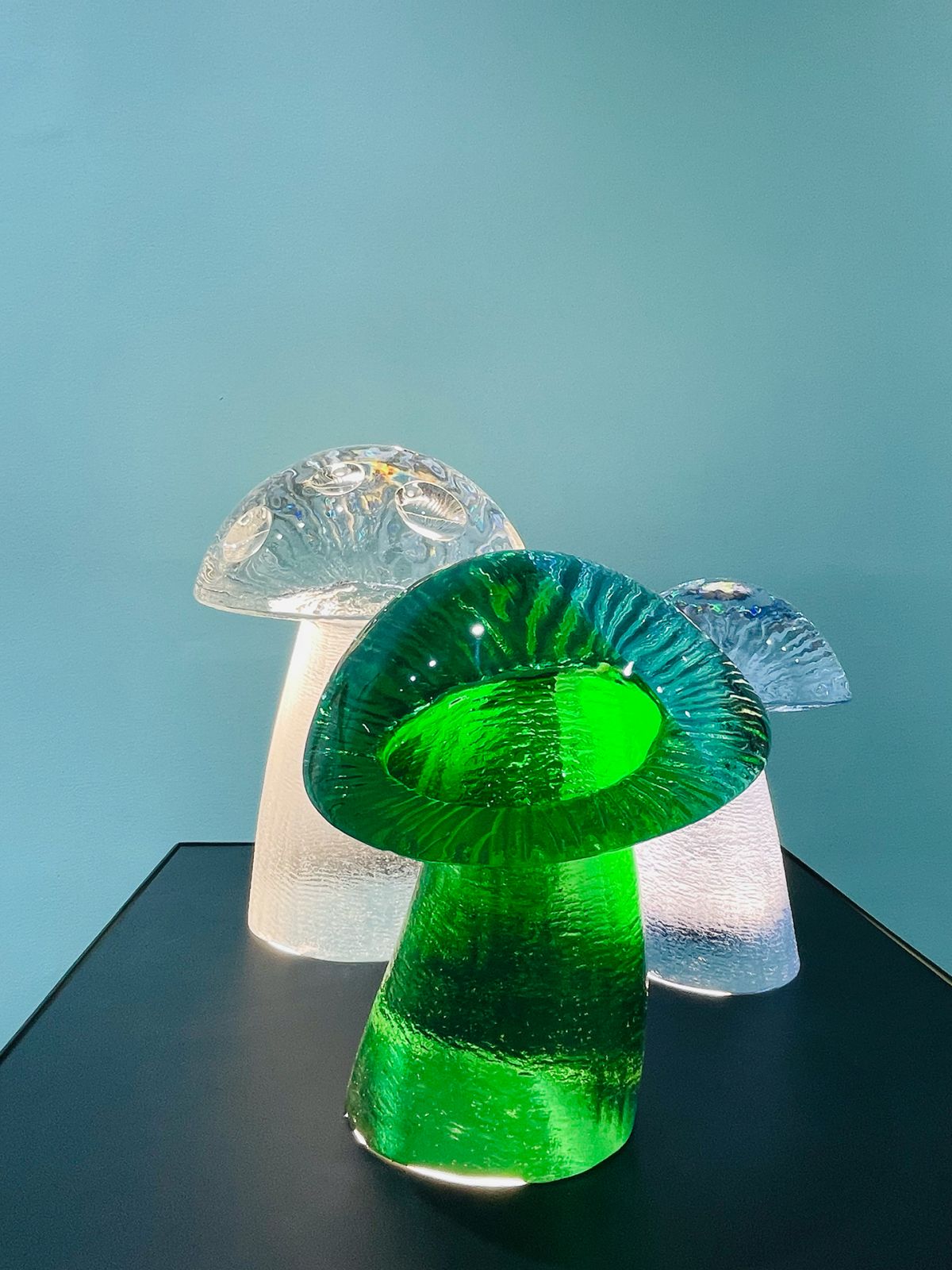 Michael Orlina, Lost in the Shrooms, 11 x 8 x 8, 9 x 7 x 7, 8 x 6 x 6 inches, carved clear optical glass, apple green glass, sky blue glass