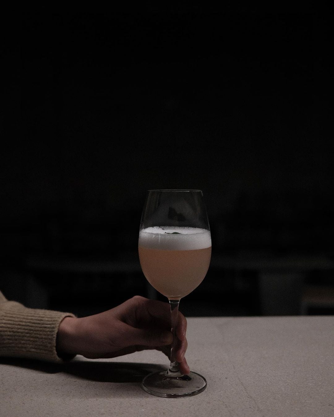 Judy: a cocktail of white rum, vermouth, dry gin, clarified pomegranate punch, thai basil, and vegan foam (Photo: Instagram / @openminded_bynorm)