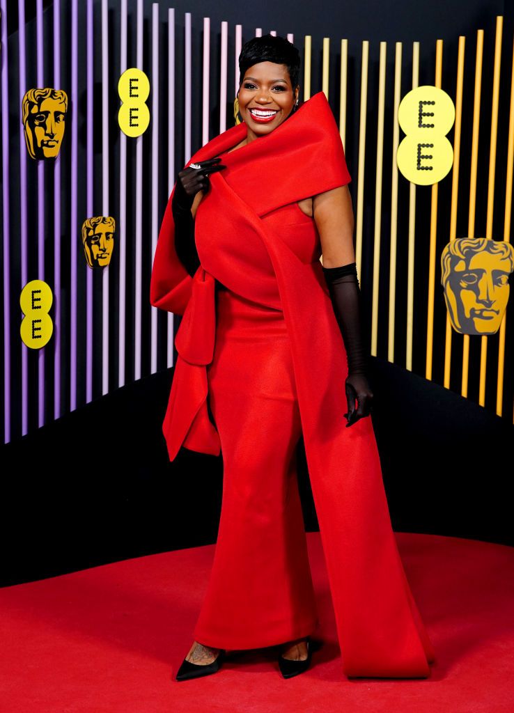 最佳女主角入圍者Fantasia Barrino穿上紅色禮服搭配Tasaki珠寶作品。(Photo by Ian West/PA Images via Getty Images)