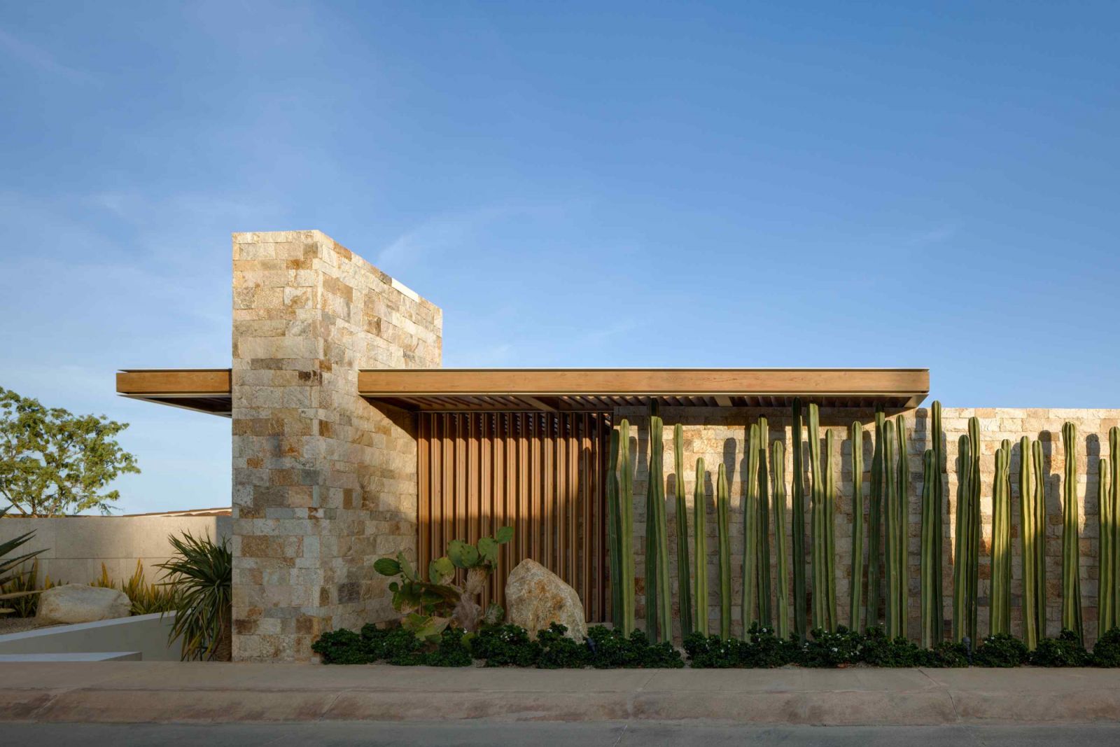The prominent quarry stone-clad façade