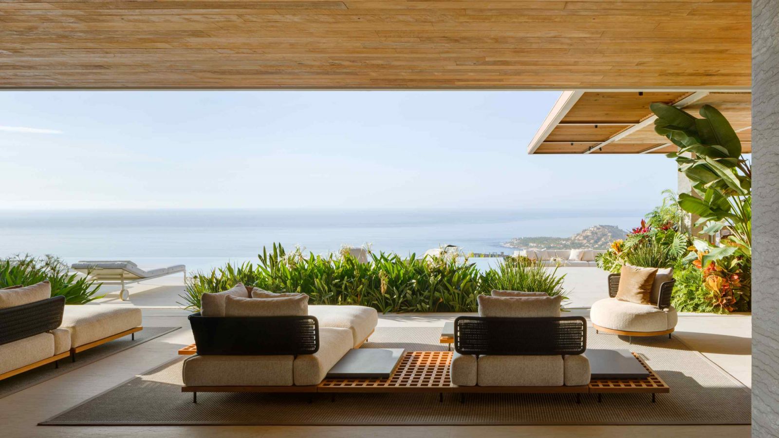 Fully retractable slider windows transform the home into a stunning mountain-top pavilion