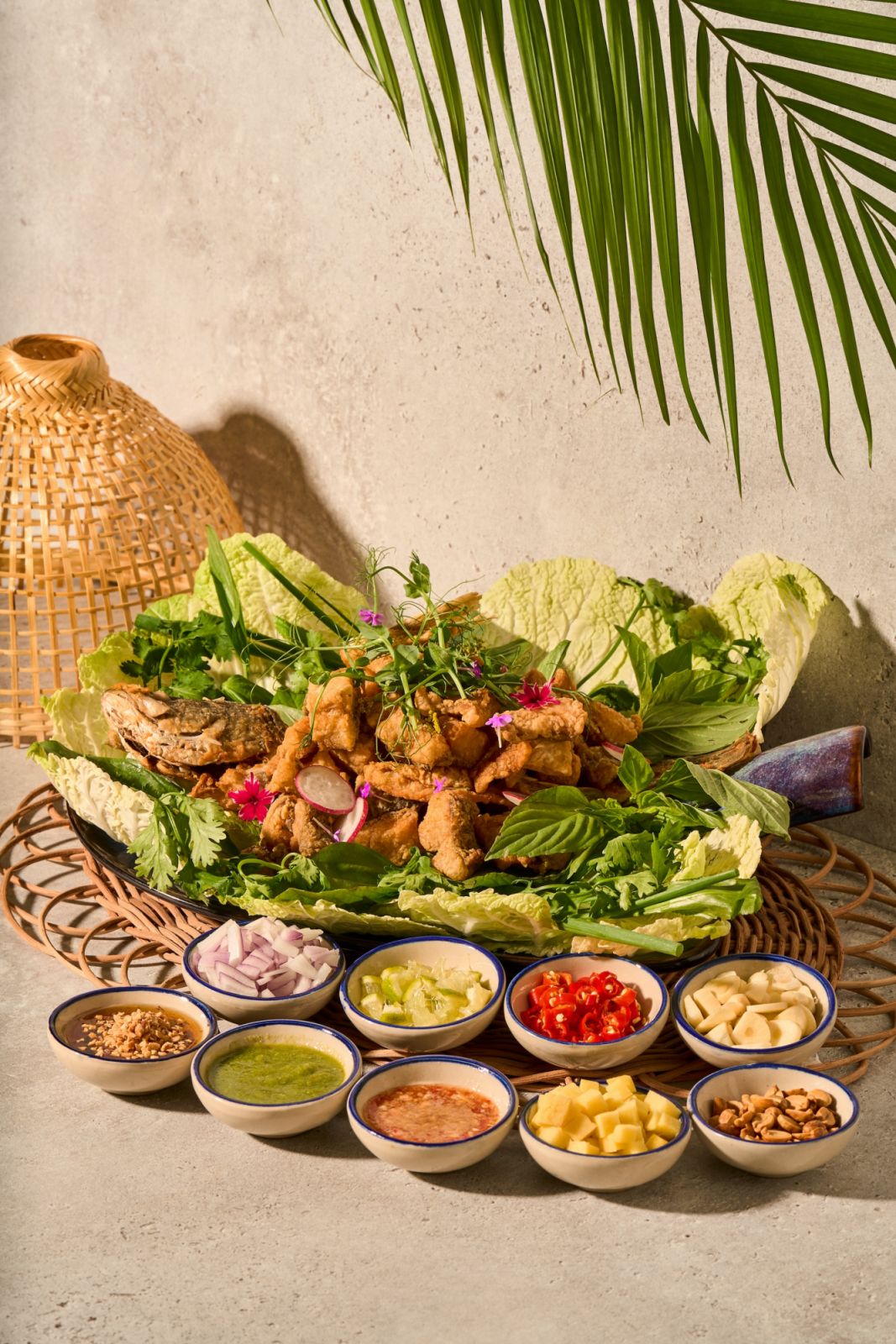 The northern Thai inspired sharing dish of Fried fish miang (Photo: Fourgather) thai restaurant singapore