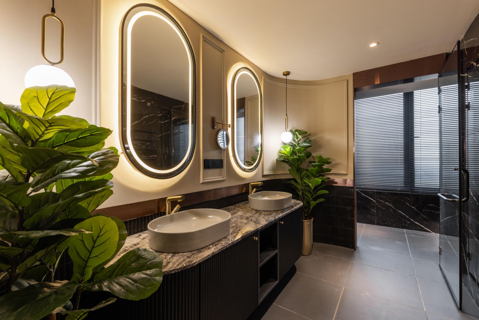 The master bathroom has a darker palette