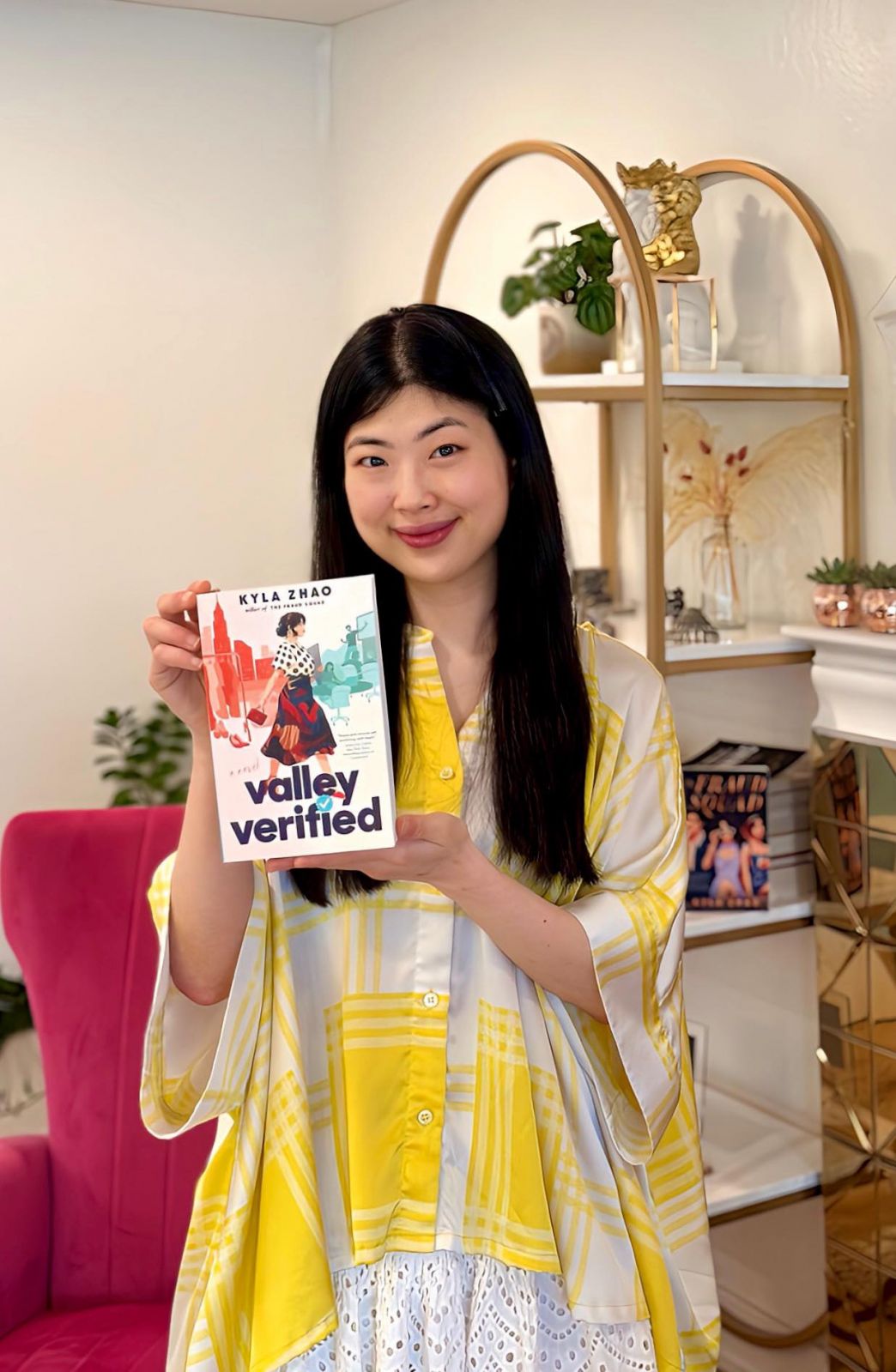 Kyla Zhao with her new book The Fraud Squad (Photo: Kyla Zhao)