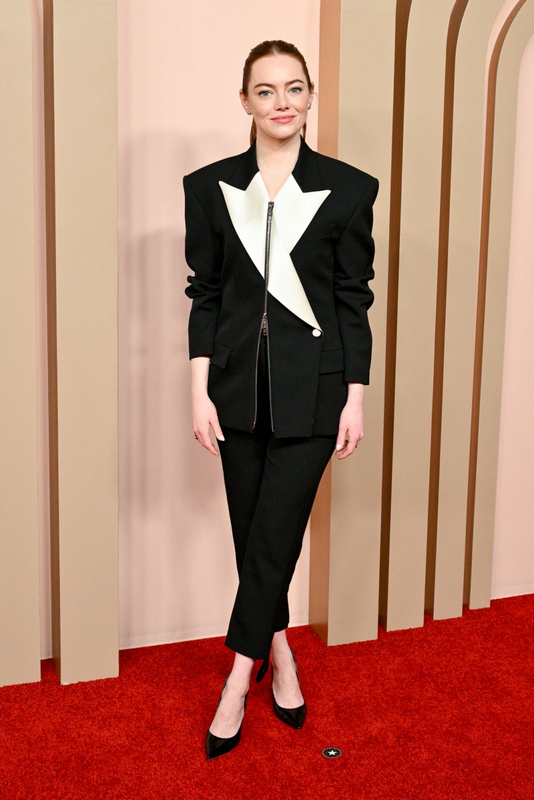 Emma Stone in Louis Vuitton custom blazer. (Photo by Michael Buckner/Penske Media via Getty Images)
