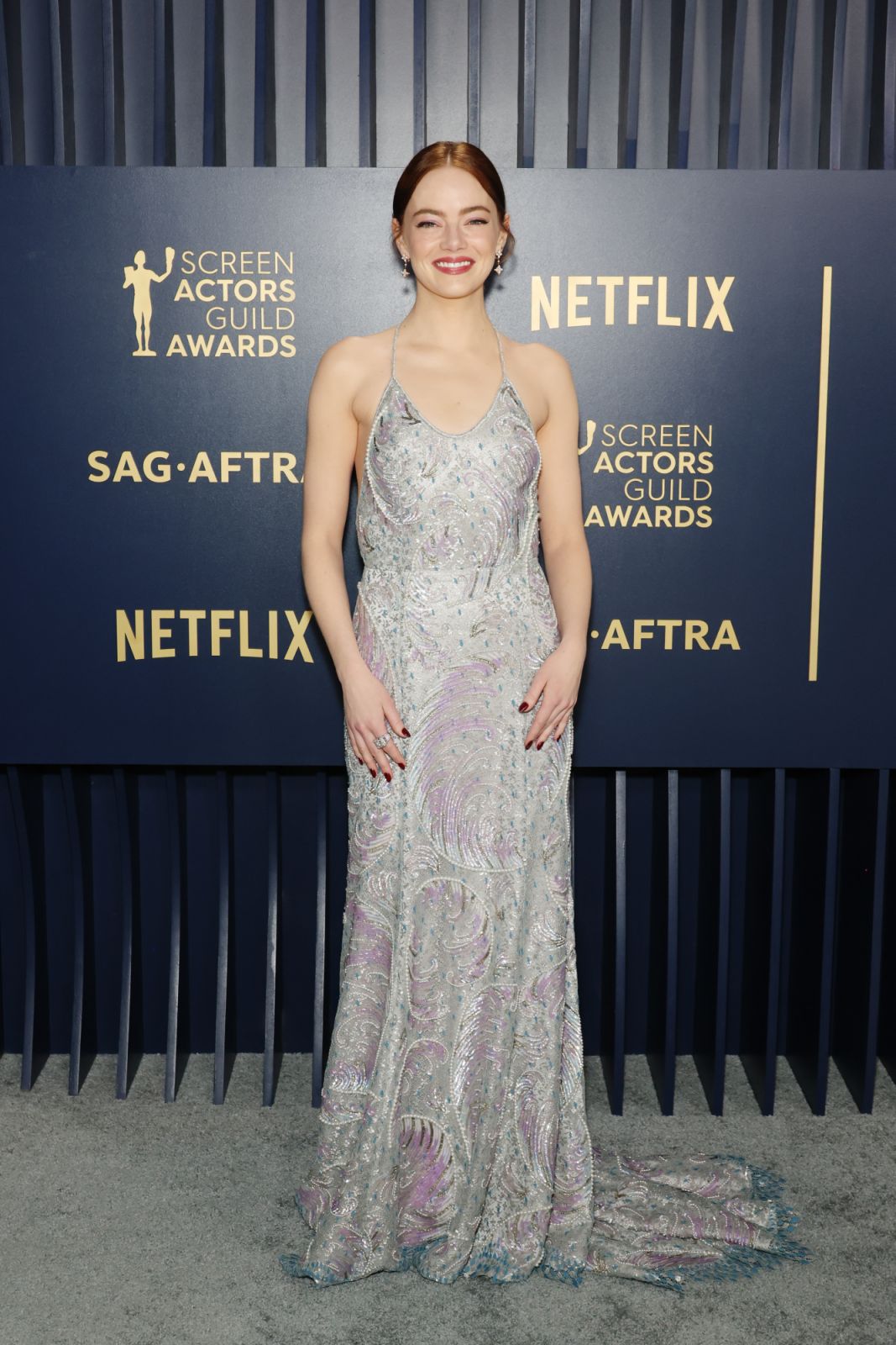Emma Stone in Louis Vuitton custom gown at the 30th Annual Screen Actors Guild Awards. (Photo by Monica Schipper/FilmMagic)