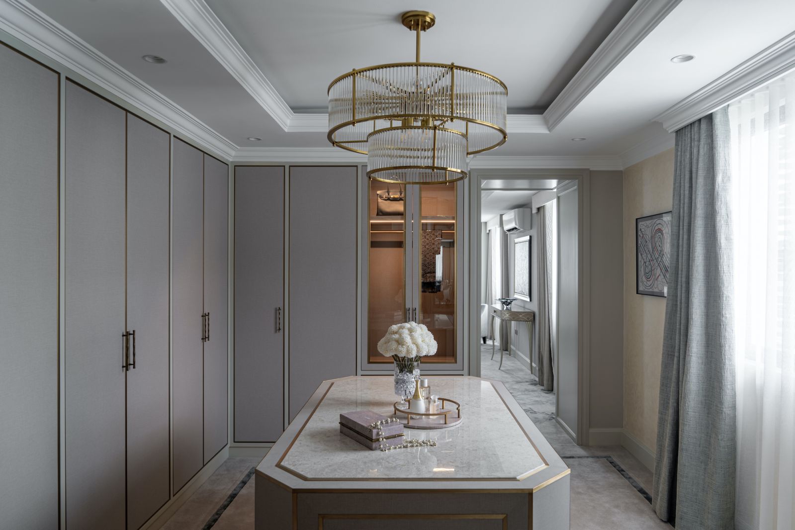 The walk-in wardrobe is reminiscent of luxury hotels