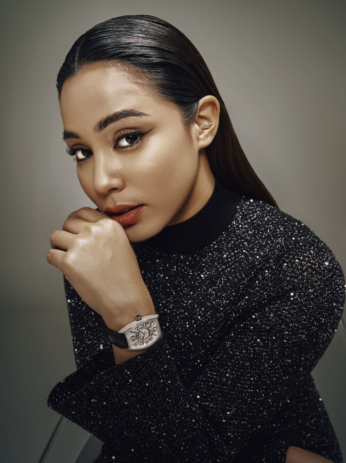Shalma wearing Franck Muller Curvex CX watch and Maje dress