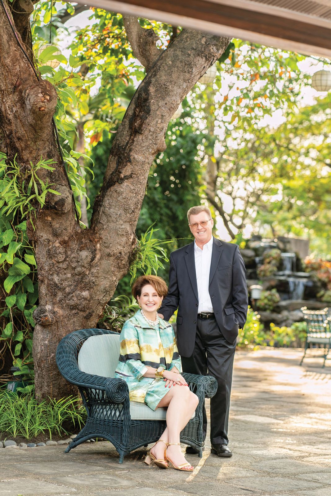 With her husband, Aubrey, in the garden. Ming Wang outfit, Naturalizer Edit 27 shoes, Arnel Papa bracelets and earrings, Philippine baroque pearl necklace