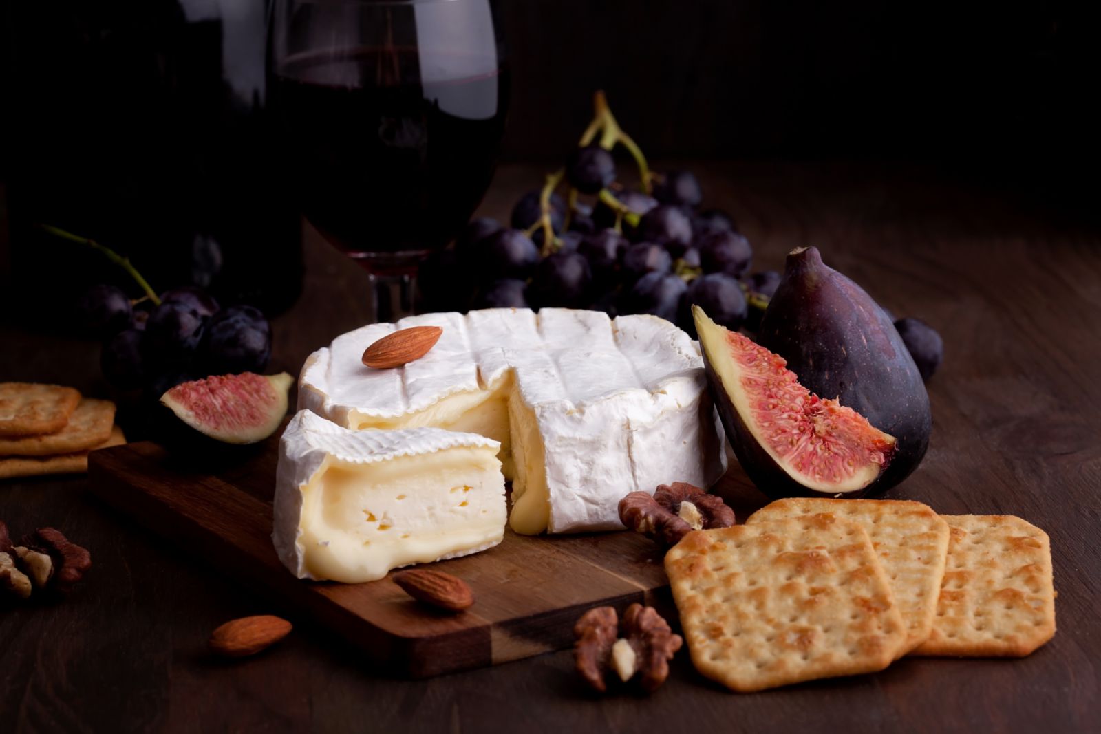 Camembert with figs, grapes, and crackers (Photo: Getty Images)