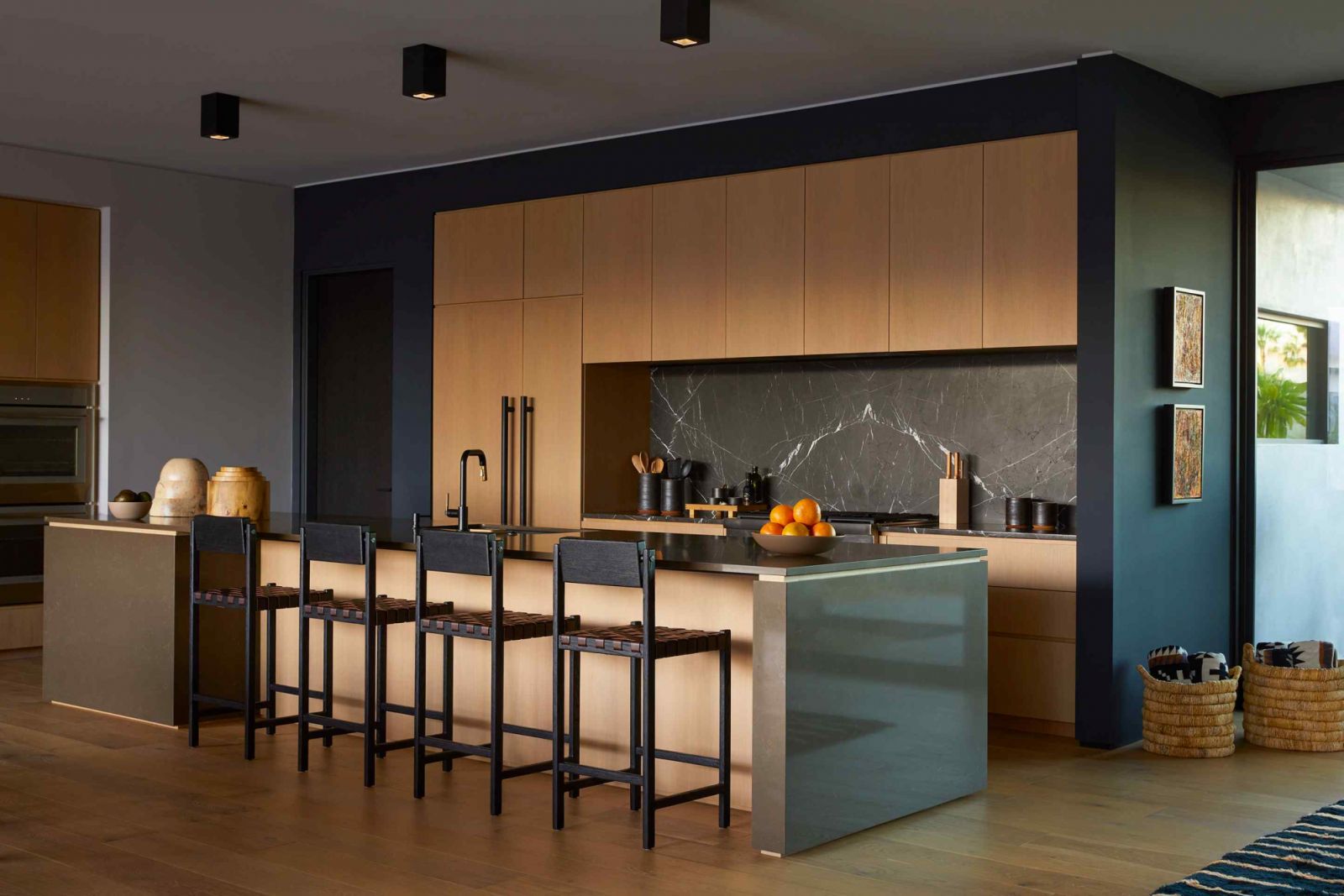 The sleek yet warm kitchen area
