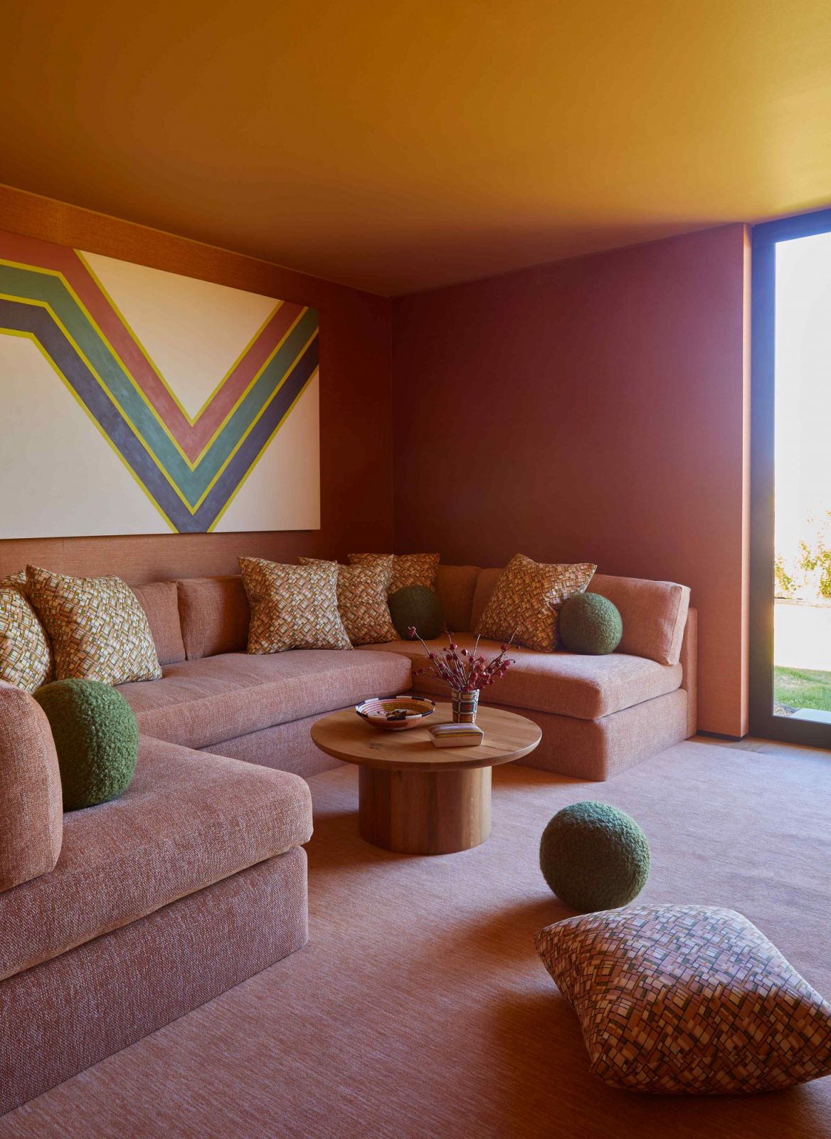 The pink-hued family room that doubles as a guest room