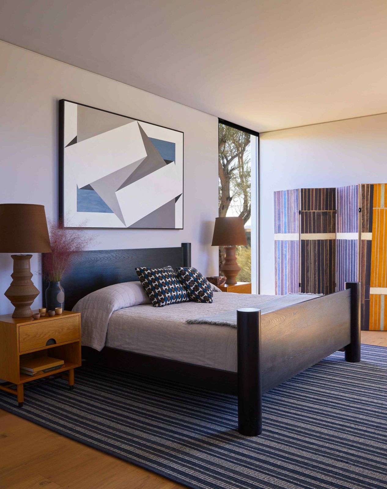 The secondary bedroom with a dawn-like palette